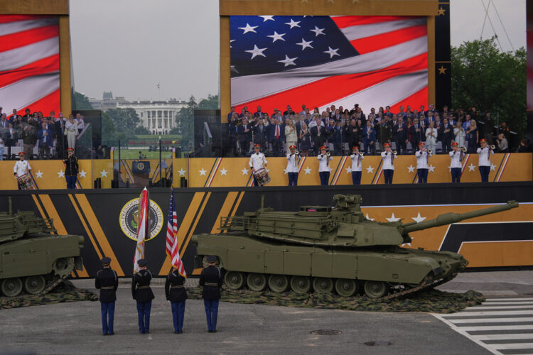 Military parade rolls through DC as 'No Kings' protesters across US decry Trump